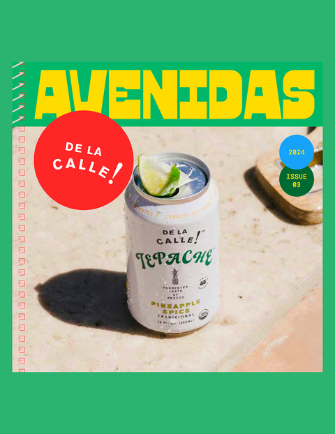 Can of 'De la Calle' tepache with a lime wedge on a stone surface, featuring the magazine 'Avenidas' cover.